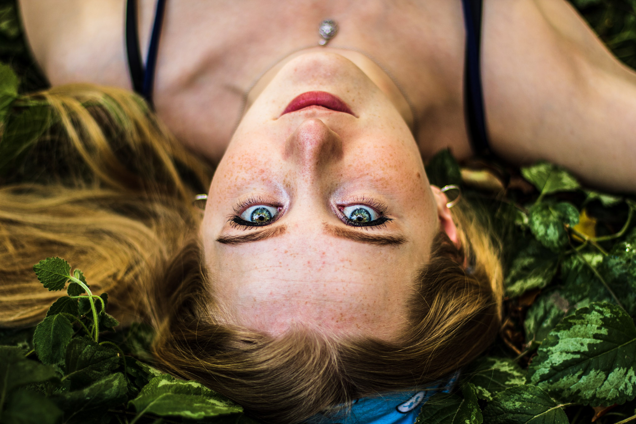 Portrait in green leaves